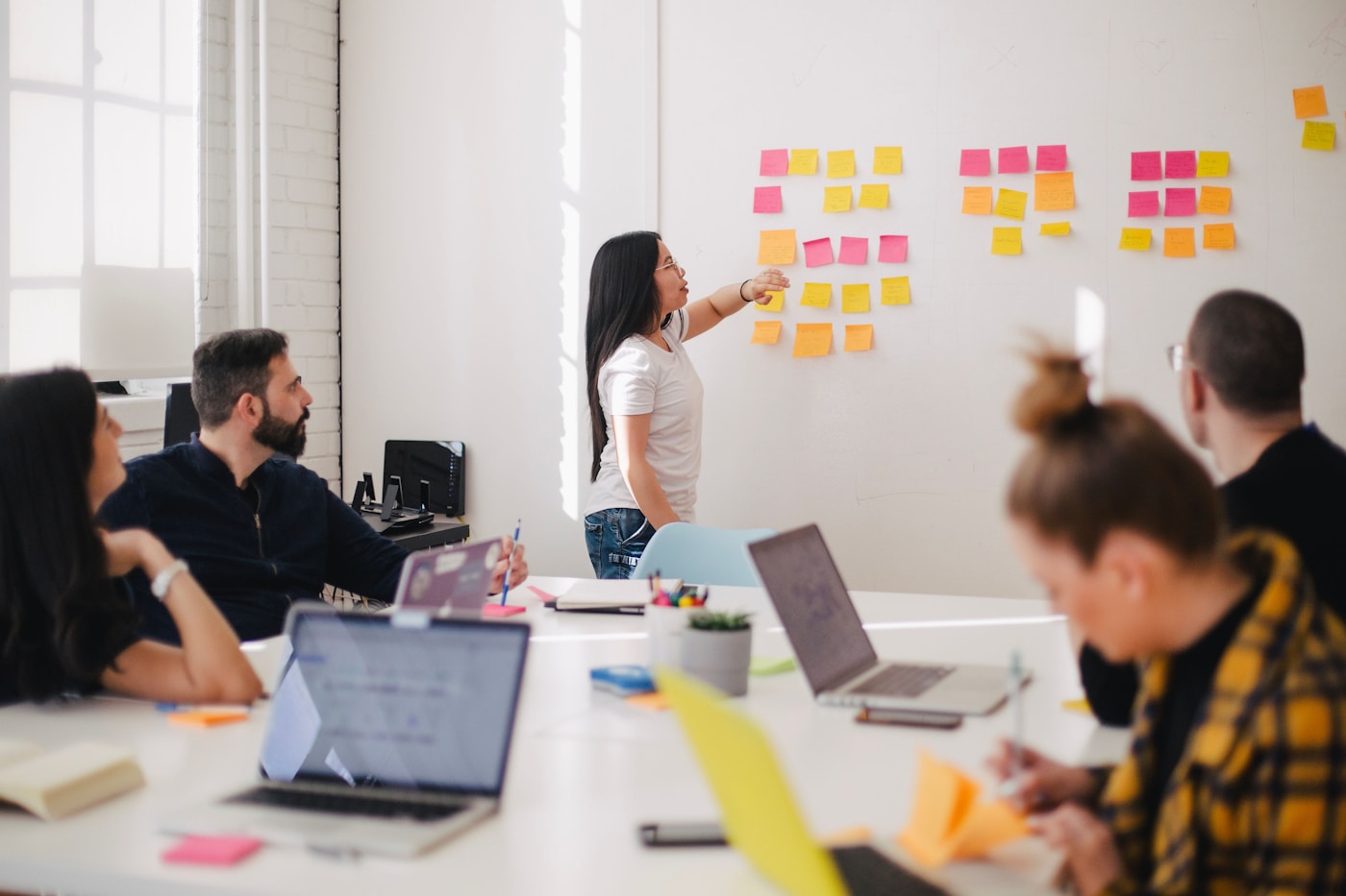 Business team discussing software solutions in a meeting