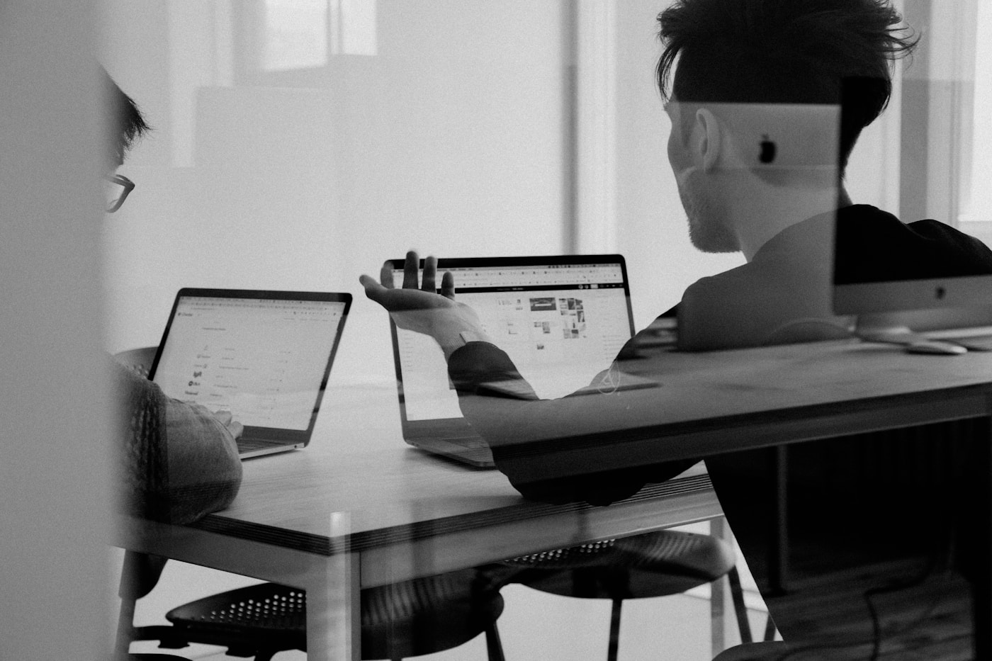 Business team reviewing ERP dashboards and operational reports