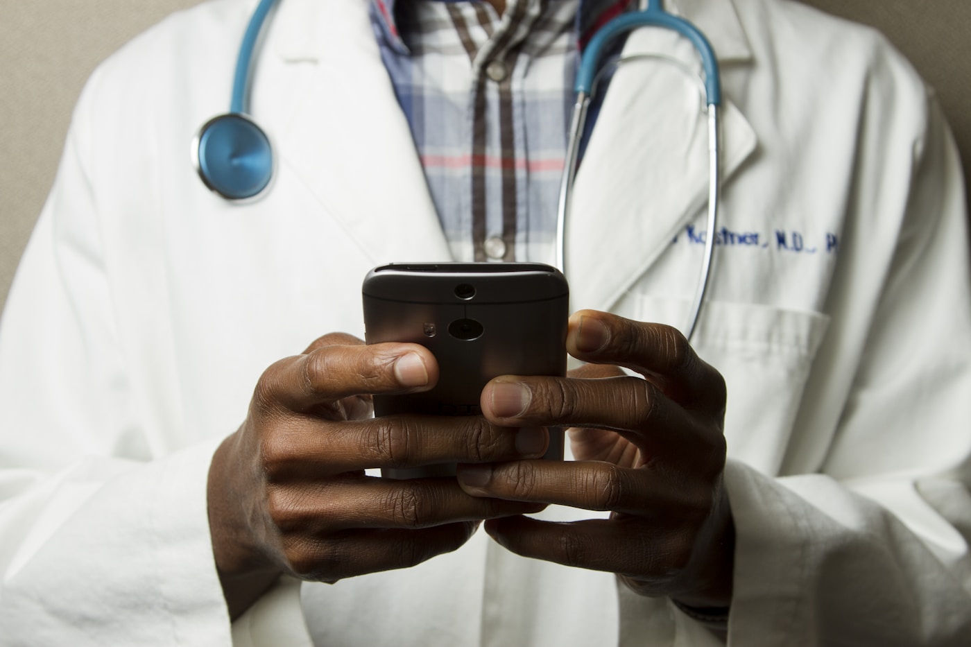 Healthcare professional using digital tools and mobile technology